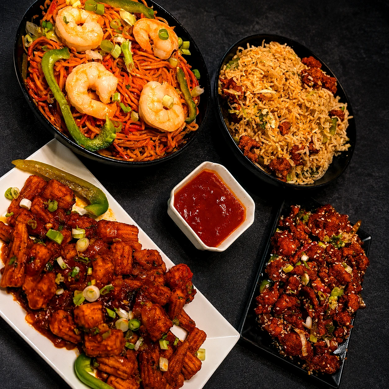 Hakka noodles, fried rice and chilli paneer