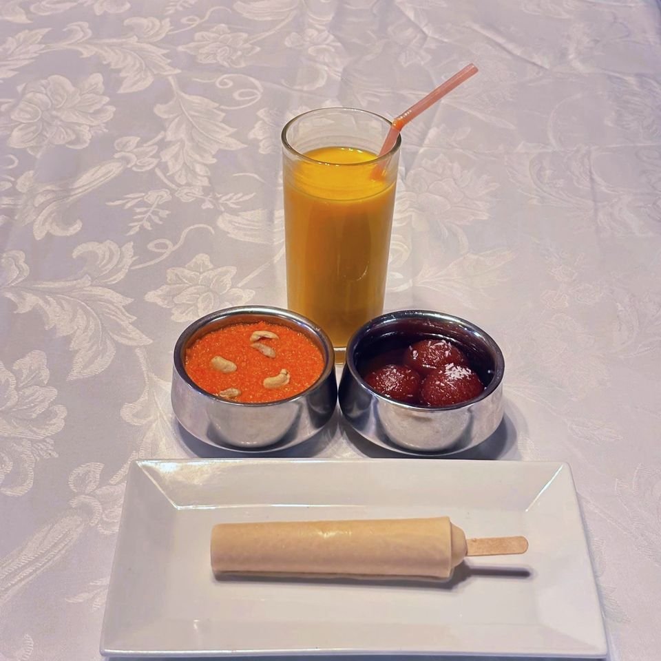 Mango lassi, carrot halwa, gulab jamun and a matka kulfi