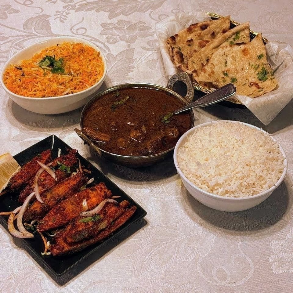 Fish fry with goat curry, basmati rice and garlic naan