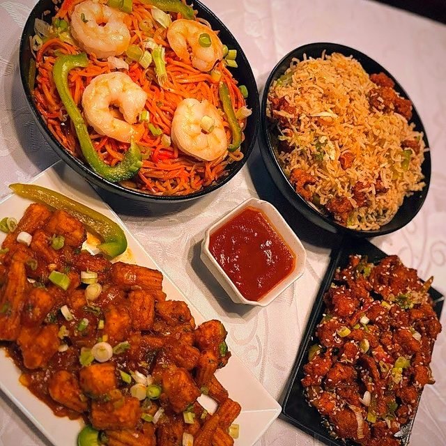 Hakka noodles, fried rice and chilli paneer