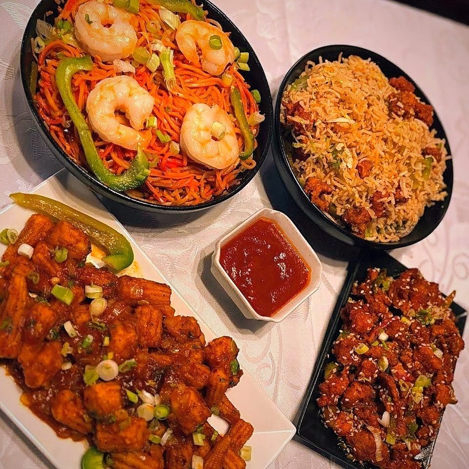 Hakka noodles, fried rice and chilli paneer