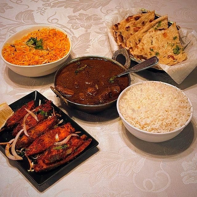 Fish fry with goat curry, rice and naan