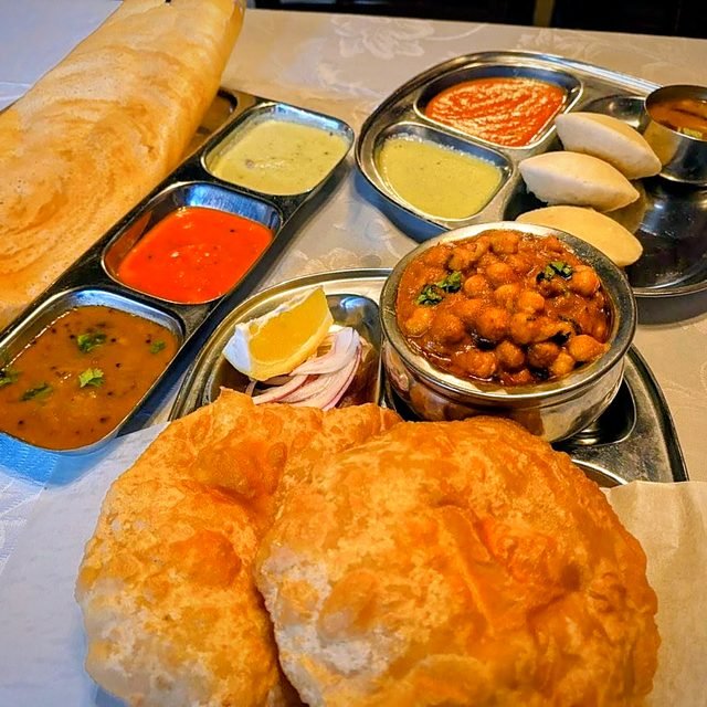 Masala dosa with chutneys and sambar